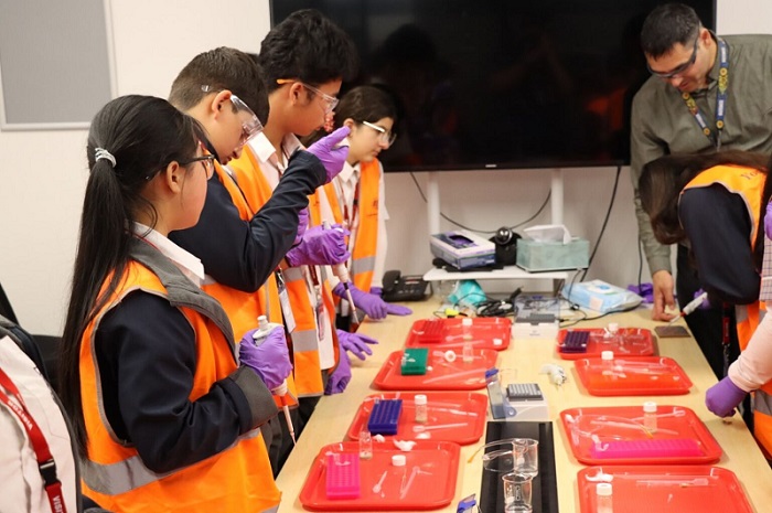 Students in PPE conduct an extraction experiment to isolate a protein