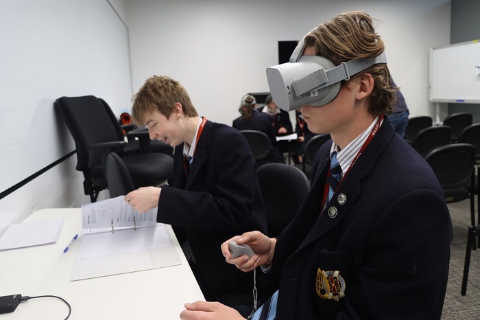 Students search for answers to a challenging virtual reality puzzle