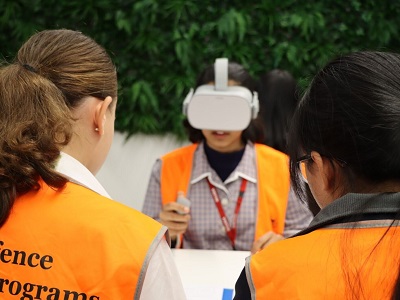 Students complete a virtual reality communication challenge