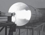 A photograph of a static firing in DSTG's rocket motor test facility.